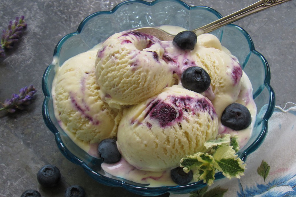 Cover image featuring a bowl of fruit-covered ice cream for a series called Eat Local.